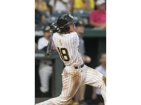 Southern Mississippi's Cole Donaldson watches his RBI double during the fourth inning against Dallas Baptist during an NCAA college baseball tournament regional game Friday, June 1, 2018, in Fayetteville, Ark.
