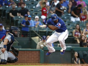 Texas Rangers' Adrian Beltre is hit by a pitch thrown by San Diego Padres starter Clayton Richard during the first inning of a baseball game Wednesday, June 27, 2018, in Arlington, Texas.