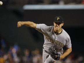 Pittsburgh Pirates starting pitcher Jameson Taillon throws a pitch against the Arizona Diamondbacks during the first inning of a baseball game Wednesday, June 13, 2018, in Phoenix.