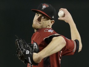 Arizona Diamondbacks pitcher Matt Koch throws in the first inning during a baseball game against the Miami Marlins, Sunday, June 3, 2018, in Phoenix.