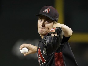 Arizona Diamondbacks pitcher Zack Greinke throws in the first inning during a baseball game against the Miami Marlins, Saturday, June 2, 2018, in Phoenix.