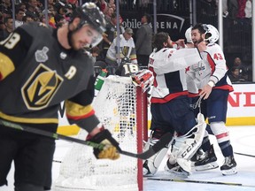 Vegas Golden Knights forward Reilly Smith (left) skates away from the Washington Capitals' Stanley Cup celebration on June 7.