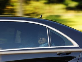 Delegates arrive at The Grove hotel for the 2013 Bilderberg conference in Watford, England.