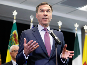 Finance Minister Bill Morneau speaks to reporters after a meeting with provincial and territorial finance ministers in Ottawa on June 26, 2018.