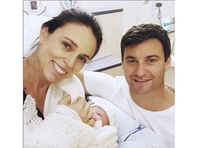 In this photo released by New Zealand Prime Minister Jacinda Ardern on Instagram, Thursday, June 21, 2018, Ardern and her partner Clarke Gayford pose with their newborn daughter at the Auckland City Hospital, Thursday, June 21, 2018, in Auckland, New Zealand. (Jacinda Ardern via AP)