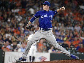 Toronto Blue Jays starting hurler Ryan Borucki delivers a pitch during the first inning of the team's game against the Astros on Tuesday night in Houston.