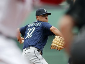 Seattle Mariners starting pitcher Marco Gonzales delivers against the Boston Red Sox during the first inning of a baseball game at Fenway Park in Boston, Sunday, June 24, 2018.