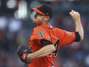 San Francisco Giants pitcher Chris Stratton works against the Philadelphia Phillies during the first inning of a baseball game Friday, June 1, 2018, in San Francisco.