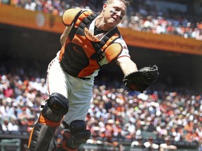 San Francisco Giants catcher Nick Hundley misses a pop up hit by Arizona Diamondbacks' Daniel Descalso in the third inning of a baseball game Wednesday, June 6, 2018, in San Francisco.