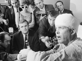 FILE - In this June 10, 1968, file photo, Paul Schrade, who was hit by one of the bullets fired by Sen. Robert Kennedy's assailant, holds a news conference in his room at Kaiser Hospital in Los Angeles. A half-century since that tragic morning, Schrade has fought the Los Angeles Police Department to reopen the assassination case over a theory that a second gunman was involved. (AP Photo, File)