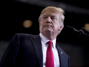 FILE - In this May 29, 2018 file photo, President Donald Trump pauses while speaking at a rally at the Nashville Municipal Auditorium, in Nashville, Tenn. Trump's personal attorney wants a federal judge to stop the lawyer for porn actress Stormy Daniels from speaking to reporters. An attorney for Michael Cohen filed court papers Thursday night, June 14, 2018, alleging Daniels' lawyer Michael Avenatti is tainting the case.