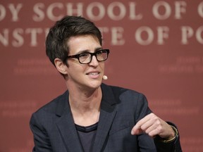 FILE - In this Oct. 16, 2017 file photo, MSNBC television anchor Rachel Maddow, host of the Rachel Maddow Show, moderates a panel, at a forum called "Perspectives on National Security," at the John F. Kennedy School of Government, on the campus of Harvard University, in Cambridge, Mass. Maddow broke down on her show live Tuesday evening, June 19, 2018, while trying to read an exclusive Associated Press story about babies and toddlers taken from their parents at the southern border and being sent to "tender age" shelters.