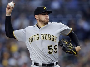 Pittsburgh Pirates starting pitcher Joe Musgrove works against a San Diego Padres batter during the first inning of a baseball game Friday, June 29, 2018, in San Diego.