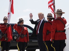 President Donald Trump arrives for the G7 Summit, Friday, June 8, 2018, in Canadian Forces Base Bagotville, Canada.