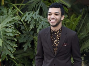 Justice Smith arrives at the Los Angeles premiere of "Jurassic World: Fallen Kingdom" at the Walt Disney Concert Hall on Tuesday, June 12, 2018.