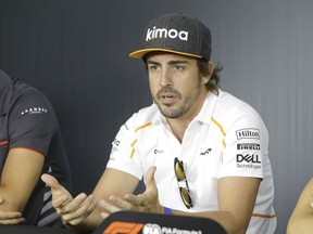 McLaren driver Fernando Alonso of Spain speaks during a news conference at the Paul Ricard racetrack, in Le Castellet, southern France, Thursday, June 21, 2018. The Formula one race will be held on Sunday.