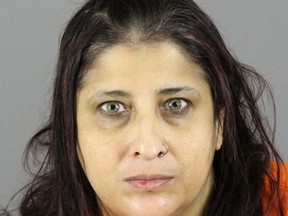 This undated photo provided by the Waukesha County Sheriff's Department in Waukesha, Wis., shows Waheba Issa Dais, of Cudahy, Wis., who is accused of trying to plan terrorist attacks with hacked social media accounts used to show self-proclaimed members of the Islamic State group how to make explosives and poisons. In a criminal complaint released Wednesday, June 13, 2018, an FBI agent also details how Dais allegedly tried to recruit people to carry out attacks for the IS. The FBI said it tracked Dais' activities to her computer in the Milwaukee suburb of Cudahy. (Waukesha County Sheriff's Department via AP)