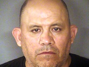 This photo provided by the Bexar County Sheriff Office in San Antonio, Texas, shows Jose Nunez, a deputy sheriff who was arrested Sunday, June 17, 2018, on a warrant for super aggravated sexual assault, pending formal charges. Nunez is accused of sexually assaulting a 4-year-old girl and threatening the child's mother with deportation if she reported him. (Bexar County Sheriff Office via AP)