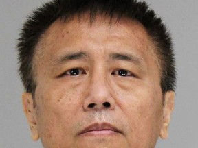 This photo provided by the Dallas County Jail shows George Guo, who is being held Thursday, June 14, 2018, on a capital murder charge. Prosecutors in Dallas say Guo, an ex-physician, has been charged in the death of a woman left incapacitated after being sexually assaulted and strangled in 1988. (Dallas County Jail via AP)