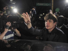 FILE - In this March 15, 2012 file photo, former Illinois Gov. Rod Blagojevich departs his Chicago home for Littleton, Colo., to begin his 14-year prison sentence on corruption charges. Imprisoned ex-governor, Blagojevich, filed paperwork Tuesday, June 5, 2018, asking President Donald Trump to commute his 14-year prison term for corruption that included seeking to sell an appointment to the Senate seat Barack Obama vacated to become president.