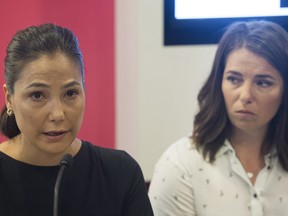 Victims of Bertrand Charest, Anna Prchal, left, and Genevieve Simard attend a news conference in Montreal, Monday, June 4, 2018.