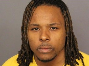 FILE - This file booking image provided by the Denver Police Department shows Michael Andre Hancock, who was arrested Friday, June 1, 2018, in connection with the fatal shooting of a passenger on Interstate 25. Hancock was charged on Thursday, June 7, 2018 with first degree murder in the shooting. (Denver Police Department via AP, File)