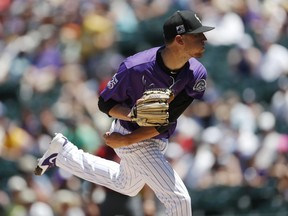 Colorado Rockies starting pitcher Kyle Freeland delivers o Arizona Diamondbacks' Paul Goldschmidt in the first inning of a baseball game against Sunday, June 10, 2018, in Denver.