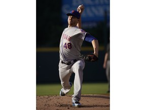 New York Mets starting pitcher Jacob deGrom throws against the Colorado Rockies during the first inning of a baseball game, Monday, June 18, 2018, in Denver.