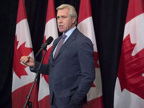 Newfoundland and Labrador Premier Dwight Ball talks with reporters as the Liberal cabinet meets in St. John's, N.L., on September 12, 2017.