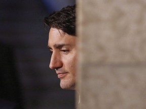 Prime Minister Justin Trudeau listens at a press conference on Parliament Hill in Ottawa on June 7, 2018. Prime Minister Justin Trudeau weighed in today on the U.S. policy of child migrants being separated from their parents at the U.S.-Mexico border and detained, calling the situation "unacceptable." Speaking briefly to reporters this morning, Trudeau said what's going on in the United States is "wrong."