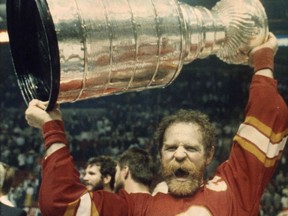 Calgary Flames' Lanny McDonald raises the Stanley Cup after defeating the Montreal Canadiens in Montreal on May 25, 1989. The only Canadian woman to have her name engraved on the Stanley Cup has died. Sonia Scurfield, who co-owned the Calgary Flames from 1985 to 1994, died this week at Foothills Hospital in Calgary. Her death was announced late Thursday by Sunshine Village ski resort, which is owned by her family. She was 89.