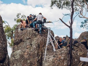 Director Larysa Kondracki, lower centre, speaks to crew members while shooting on location for "Picnic at Hanging Rock" in Woodend, Victoria, Australia, in this 2017 handout photo. At first, Larysa Kondracki didn't think directing a TV miniseries based on the novel "Picnic at Hanging Rock" was going to be much of a picnic. "When the idea first came up I said, 'Absolutely not, that's a classic,'" Kondracki recalls. The Toronto native had seen the 1975 film directed by Peter Weir and was reticent about following in the Australian's footsteps.