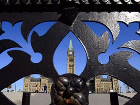 The centre block of Parliament Hill is seen from the front gates in Ottawa on April 23, 2018. The Senate won't officially move out of its current home until the end of the calendar year, potentially pushing the start of a badly-needed renovation of the Centre Block until at least 2019. Federal officials overseeing a massive renovation of the buildings that make up the parliamentary precinct in the capital had planned to close the Centre Block for a decade-long rehab starting this year.