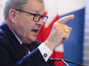 Lawrence MacAulay, Minister of Agriculture and Agri-Food, takes part in a press conference in Ottawa on June 13, 2018. Amid escalating trade tensions between Canada and the United States, Agriculture Minister Lawrence MacAulay is throwing open his barn door to U.S. Secretary of Agriculture Sonny Perdue for a meeting Friday on his family farm in northeastern Prince Edward Island. The dairy farm will serve as a backdrop to bilateral talks expected to touch on Canada's system for controlling the price and supply of dairy, eggs and chicken -- something the U.S. administration has made clear it wants abolished.