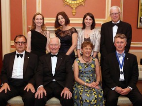 Members of the Toronto Star pose for a photograph with Governor General David Johnston, front row second from left, and his wife Sharon after the Toronto Star won the Michener Award for Journalism at a ceremony at Rideau Hall the official residence of the Governor General, in Ottawa, Wednesday June 11, 2014. Front row left to right, Michael Cooke, Governor General Johnston, Sharon Johnston, Kevin Donovan. Back row left to right, Jane Davenport, Irene Gentle and Jayme Poisson and Russell Mills, president of the Michener awards foundation. The Toronto Star has named Irene Gentle as its new editor, the first woman to hold the job.Gentle replaces Michael Cooke, who announced earlier this year that he would be retiring in June.THE CANADIAN PRESS/Fred Chartrand