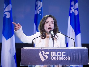 Newly acclaimed Bloc Quebecois leader Martine Ouellet addresses supporters during a rally in Montreal on March 18, 2017. Bloc Quebecois members are voting on Martine Ouellet's leadership, with the results to be announced Sunday. Ouellet has said she believes getting the support of 50 per cent plus one will give her the legitimacy to stay on as head of the embattled party.