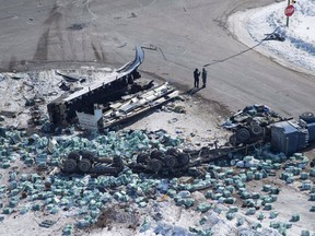 The wreckage of a fatal crash outside of Tisdale, Sask., is seen Saturday, April, 7, 2018. A retired police chief wants the coroner's office in Saskatchewan to develop a plan for responding to mass casualties.Former Saskatoon police chief Clive Weighill says the office was tasked with creating such a plan 13 years ago but none exists.