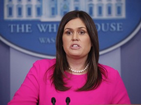 White House press secretary Sarah Huckabee Sanders speaks to the media during the daily briefing in the Brady Press Briefing Room of the White House, June 25, 2018. A Canadian restaurant owner inundated by angry reviews because her brunch spot bears a similar name to the U.S. eatery that refused to serve White House press secretary Sarah Huckabee Sanders says she knows firsthand the drawbacks of mixing politics with business.