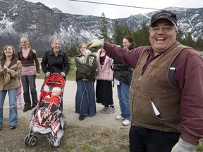 Winston Blackmore, the religious leader of the polygamous community of Bountiful located near Creston, B.C. shares a laugh with six of his daughters and some of his grandchildren Monday, April 21, 2008 near Creston, B.C. This week, a court in Newfoundland and Labrador recognized three unmarried adults as the legal parents of a child born within their "polyamorous" family.