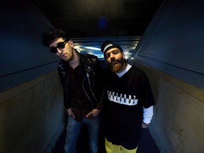 Chromeo band members David Macklovitch, left, and Patrick Gemayel pose for a photograph in Toronto on Friday, May 2, 2014. Five albums into Chromeo's legacy and the funk-flexing duo from Montreal are rethinking how they use female imagery.