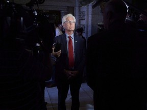 Minister of Natural Resources Jim Carr speaks to reporters following Question Period in the House of Commons on Parliament Hill in Ottawa on Tuesday, May 29, 2018. The federal government has taken a step towards fulfilling it's promise to get rid of fossil fuel subsidies by agreeing to finally explain how much it actually spends on them.