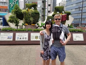 Ryan Hoag, his wife Wiyani Prayetno and their infant daughter are seen in Tokyo in this undated handout photo. A Vancouver lawyer says five families from British Columbia are stuck in limbo in Japan, unable to return due to a bureaucratic breakdown. Alex Stojicevic represents all of the families, who travelled to Japan to pick up their newly adopted babies, and he says they have been unable to return to Canada because the federal government has refused to issue visas for the children.