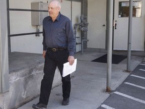 James Oler, who was found guilty of practising polygamy in a fundamentalist religious community, leaves court in Cranbrook, B.C., Monday, July 24, 2017. A special prosecutor is set to ask British Columbia's Court of Appeal to overturn the acquittal of a former leader of a polygamous community who was found not guilty of taking a girl across the border for a sexual purpose.