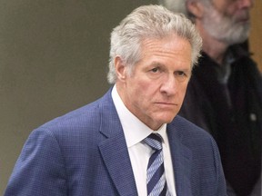 Former construction magnate Tony Accurso walks to the courtroom at his trial in Laval, Quebec on Monday, November 13, 2017.