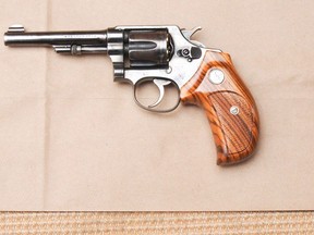 A photograph of a gun released at Dellen Millard's trial for allegedly killing his father, Wayne Millard, released Thursday, May 31, 2018. The photo was taken by Toronto police on Nov. 29, 2012, at Wayne Millard's house in Etobicoke. THE CANADIAN PRESS/HO