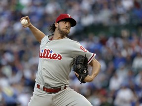 Philadelphia Phillies starting pitcher Aaron Nola delivers during the first inning of a baseball game against the Chicago Cubs Wednesday, June 6, 2018, in Chicago.