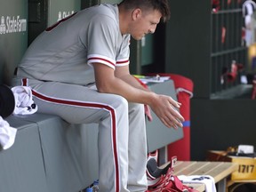 Philadelphia Phillies starting pitcher Nick Pivetta sits in the dugout during the fifth inning of a baseball game against the Chicago Cubs Thursday, June 7, 2018, in Chicago.