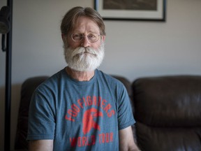David Dunn, whose wife took her own life earlier this year after she was denied assisted death, sits for a photograph in his home in Saskatoon, Wednesday, June 6, 2018.