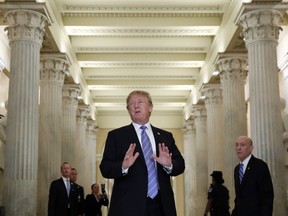 President Donald Trump speaks in the Hall of Columns as he arrives on Capitol Hill in Washington, Tuesday, June 19, 2018, to rally Republicans around a GOP immigration bill. However Republicans on Capitol Hill, mindful of the country's spreading outrage over separating families at the border, have been frantically searching for ways to end the Trump administration's policy.