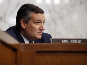 Sen. Ted Cruz, R-Texas, listens to an answer to his question of Department of Justice Inspector General Michael Horowitz and FBI Director Christopher Wray testify during a hearing of the Senate Judiciary Committee to examine Horowitz's report of the FBI's Clinton email probe, on Capitol Hill, Monday, June 18, 2018 in Washington.